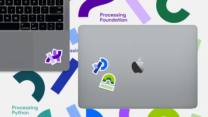 Two laptops with stickers showcasing the new logos for the Processing Foundation, Processing and Processing Android.