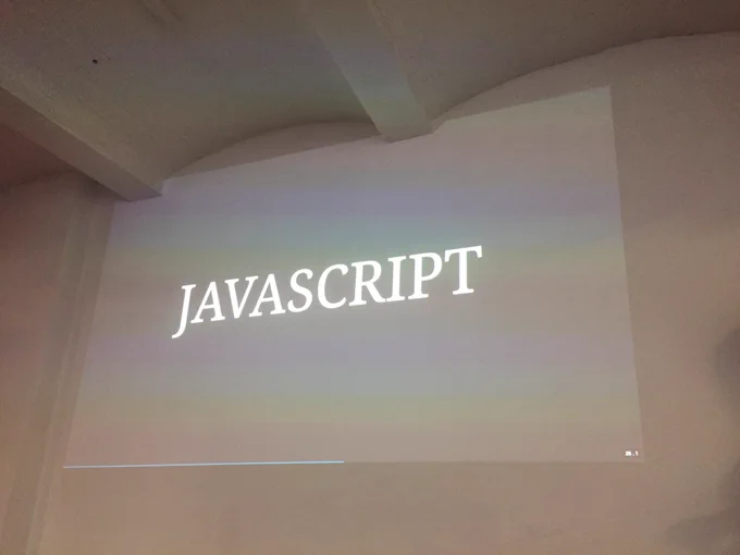 A slide that just says “JavaScript”.