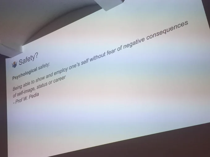 A slide with the definition of psychological safety as “Being able to show and employ one’s self without fear of negative consequences of self-image, status or career”.