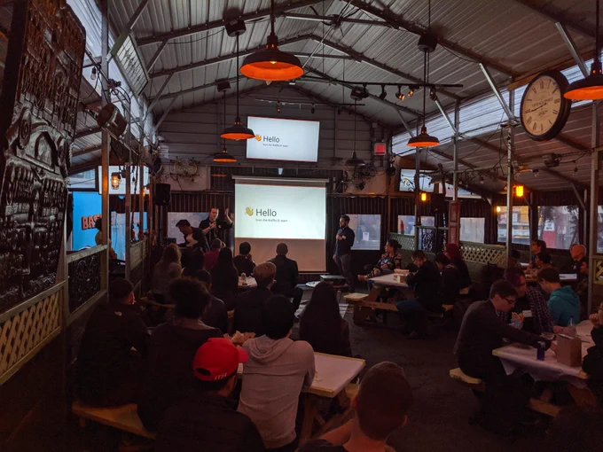 Our friendly MCs in the barn with all our adoring Waffle Js Attendees.
