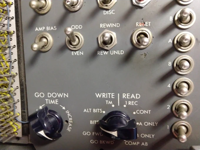 A close-up of the tape control panel showing various switches.