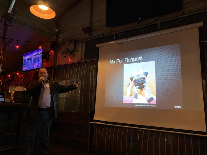 Slide that says “no pull request” and shows a picture of a pug pulling on a rope toy