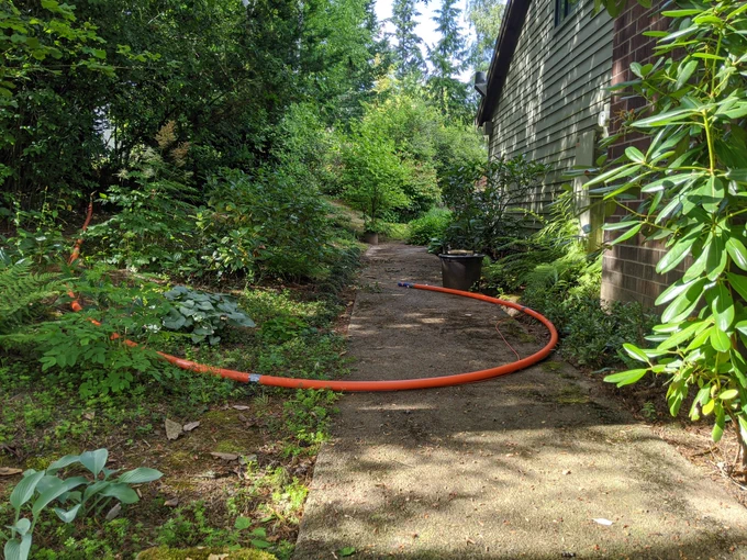 The last twenty feet or so will need to be hand dig.  And under the walkway