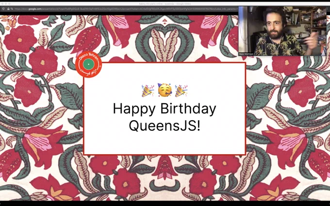 Screenshot of a Zoom seminar with a video feed of Mani Nilchiani in the upper right hand corner and a nice opening slide in the main area that says "Happy Birthday QueensJS!" with a nice floral background.