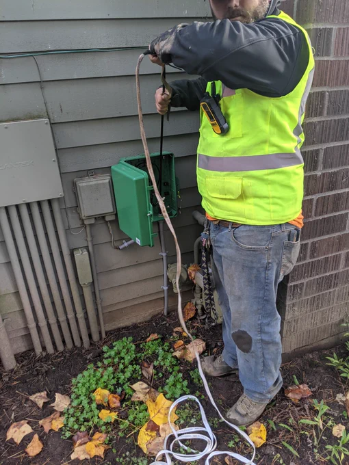 Pulling through small conduit under walkway and into the box.