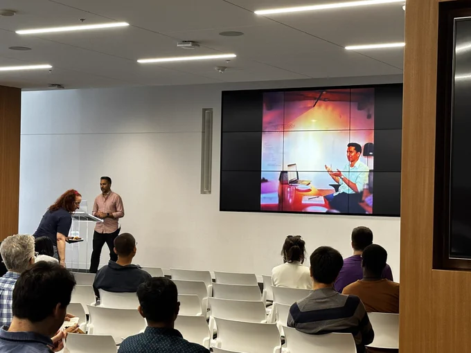 Taz giving talk about “A Community of Champions” at Refactor DX Toronto