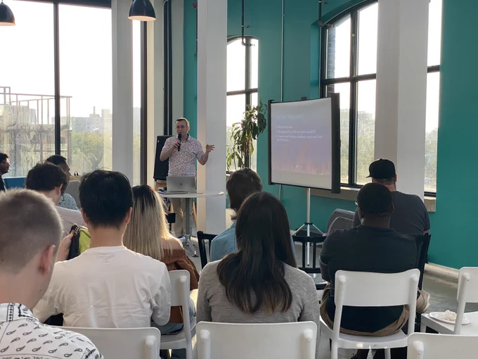 Marco Campos presenting to TJS community members