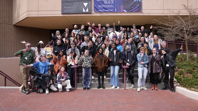 A group image of all the participants and organizers of OSACC. This photo was taken in front of a University of Denver building.

