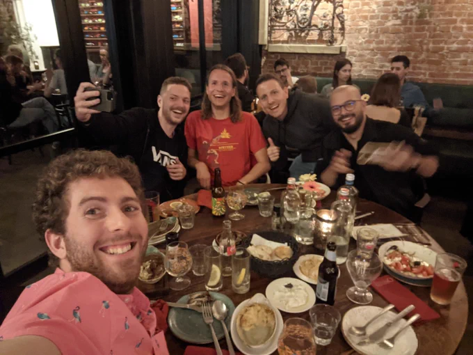 Selfie of with Alex, Nico, Giorgio, and Medhat at a dinner table