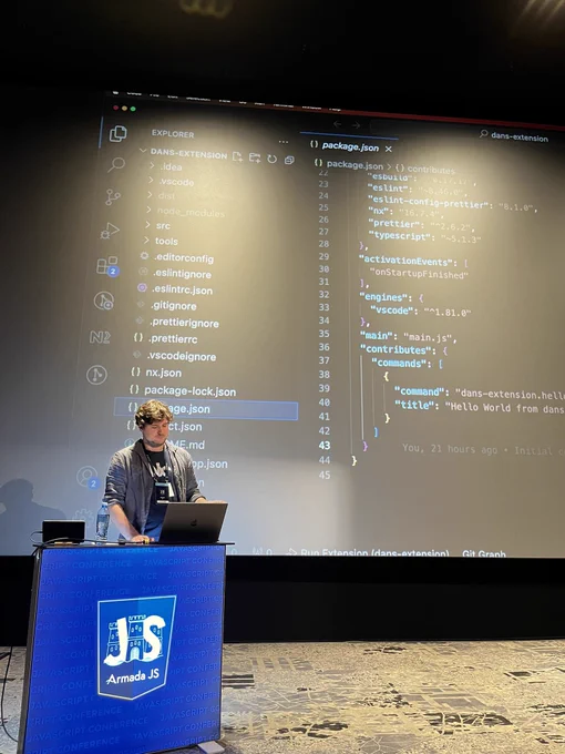 Max on stage with VSCode IDE on slide