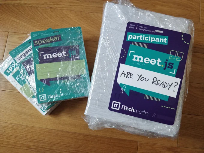 Hundreds of conference badges in shrinkwrap