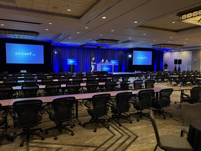 empty conference room with chairs and the live stage in the background. Everything ready for the conference start