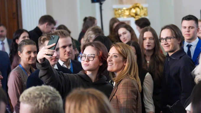 The President of the European Parliament Roberta Metsola with young people in Riga, Latvia.
