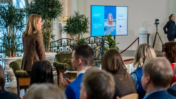 The President of the European Parliament Roberta Metsola with young people in Riga, Latvia.