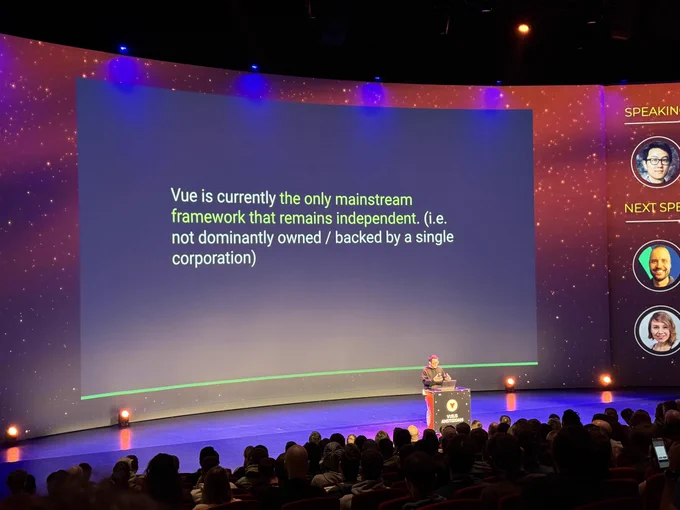 Evan You on stage with a slide that says “Vue is currently the only mainstream framework that remains independent.”