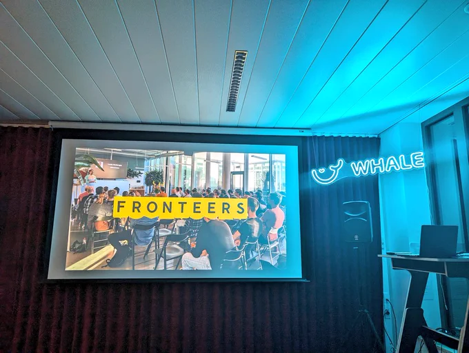 Slide with fronteers logo and host of evening whale logo