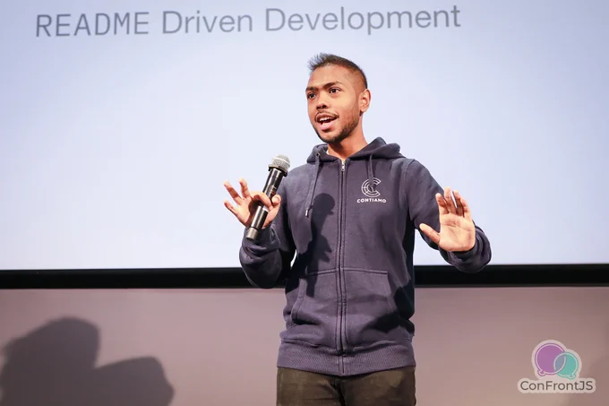 Tejas Kumar at ConfrontJS 2018 - "Readme Driven Development" in the background
