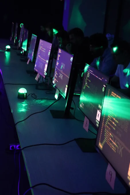 Photo of participants' screens lined up during an event