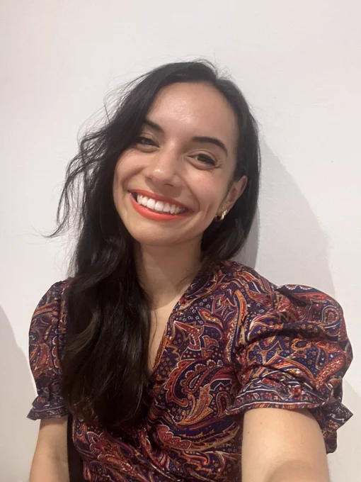 Natalie Marleny smiling BECAUSE SHE IS ON HOLIDAY